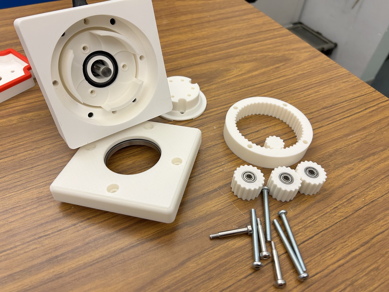 Printed gearbox parts laid out before assembly
